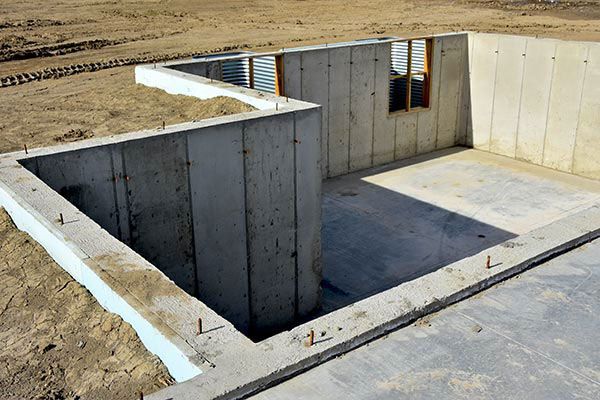 Basement excavation underway on a building site