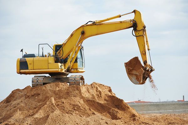 Excavator loading a tipper truck